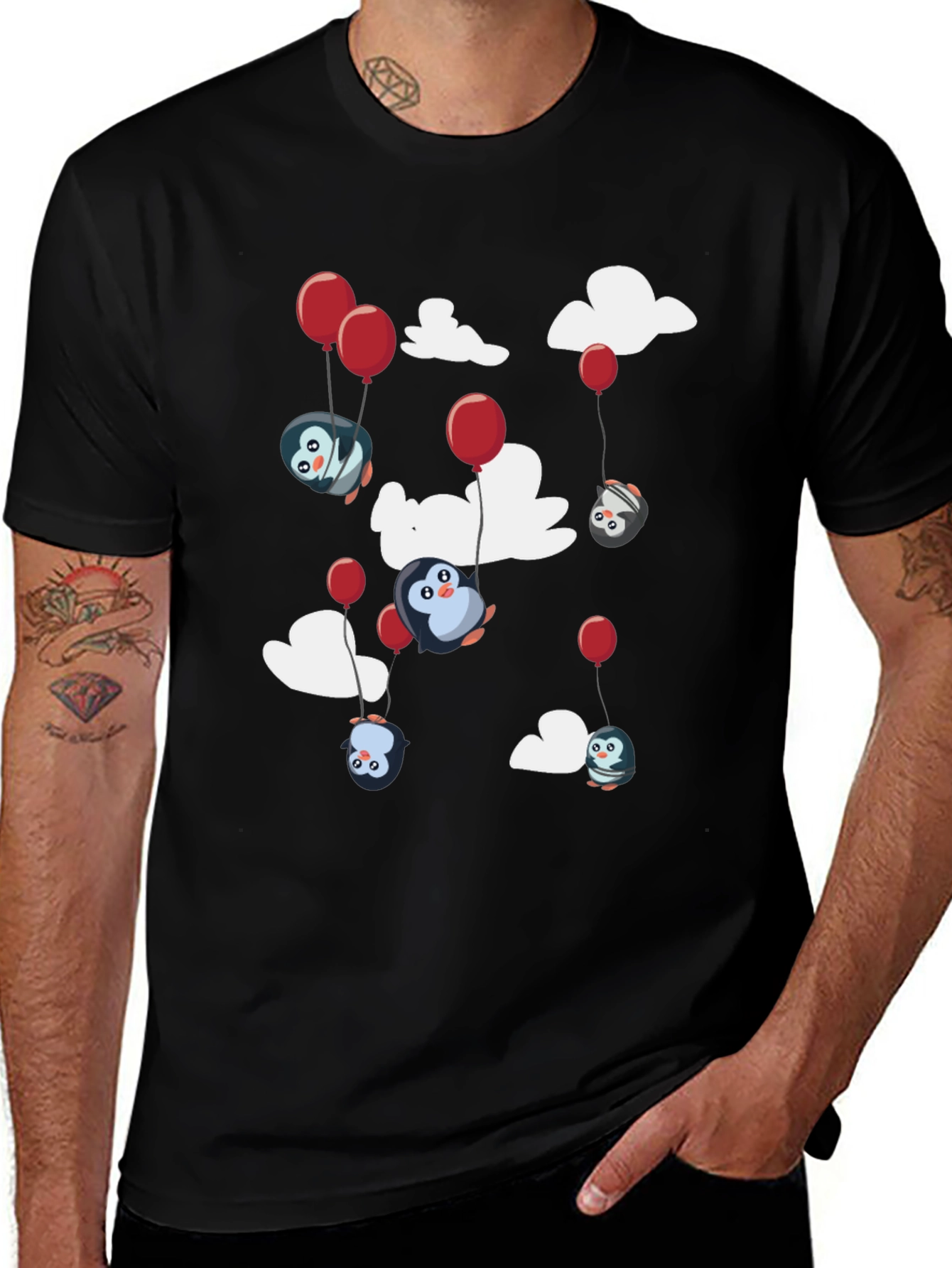 Camiseta Negra Estampada con Pingüinos Voladores