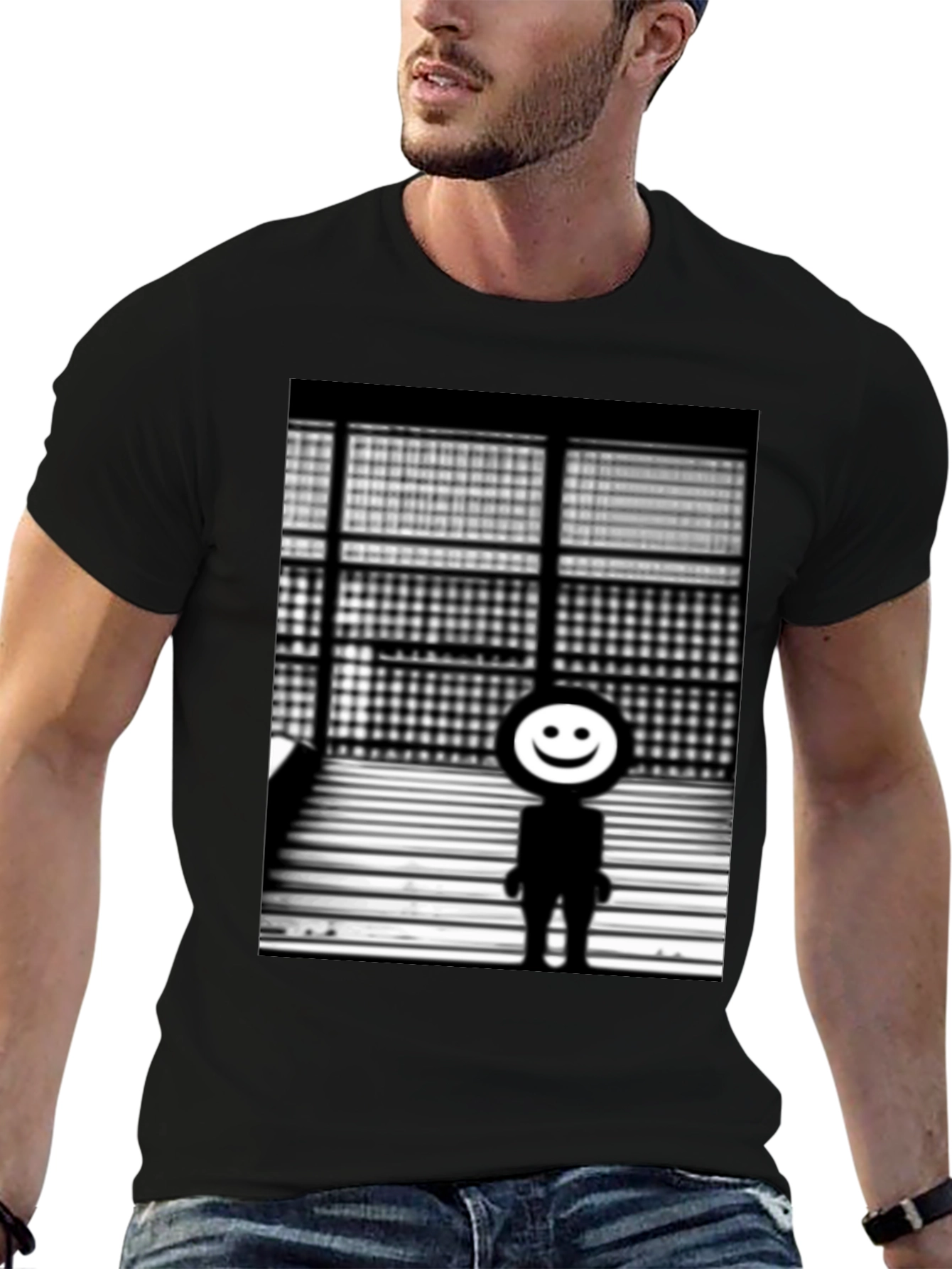 Camiseta Negra con Diseño Abstracto Sonriente